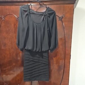 Elegant Black Dress with Draped Skirt